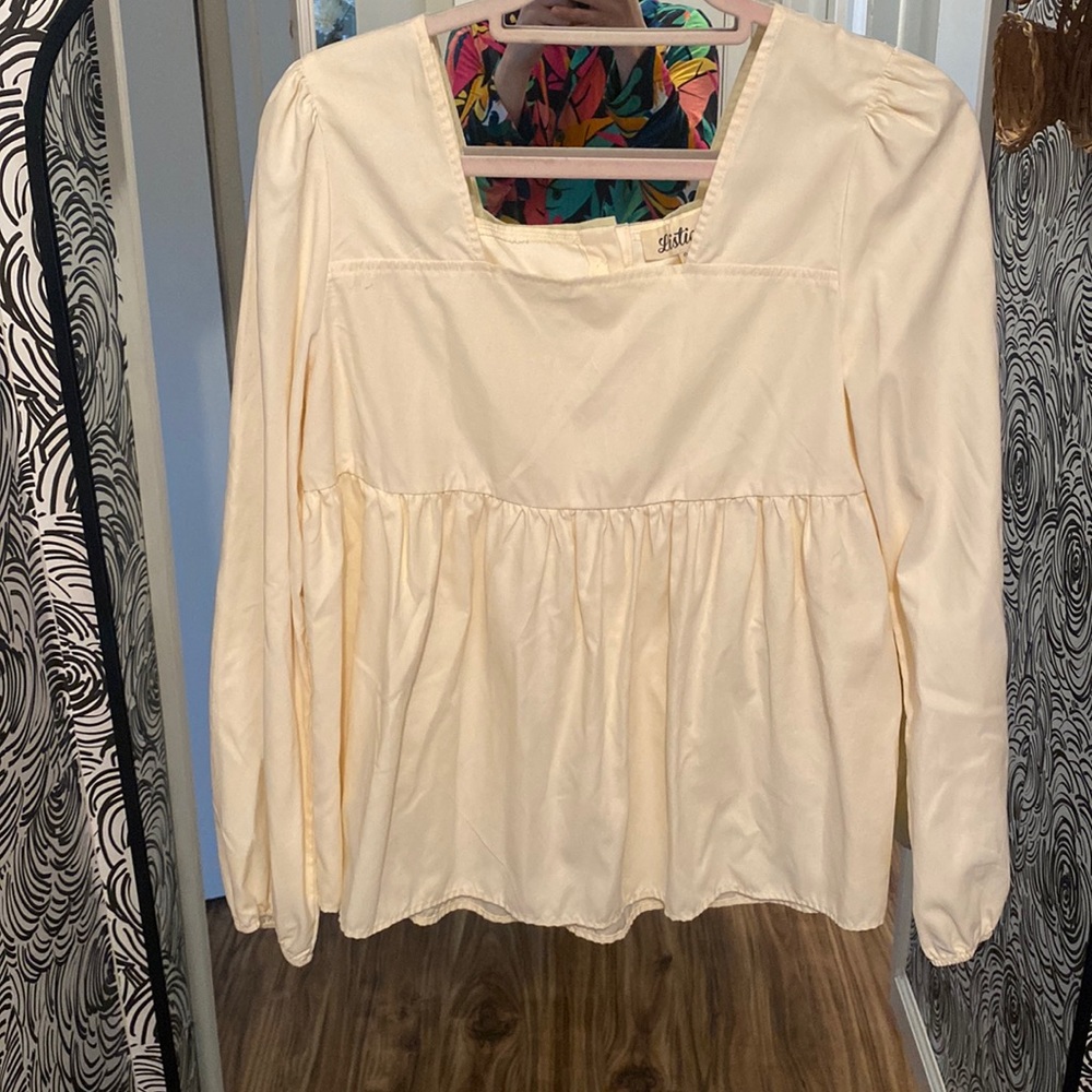 Cream peplum top